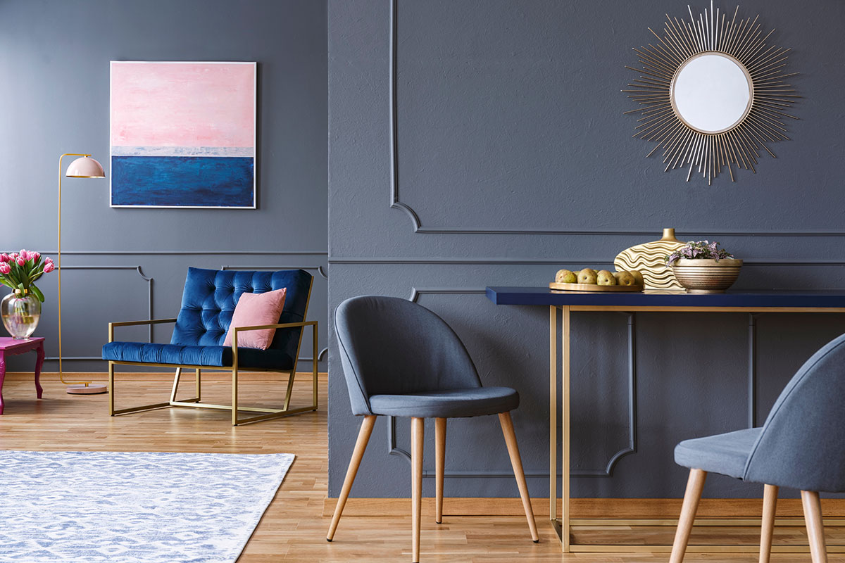 An excellent example of interior painting in an apartment’s dining room and living room area
